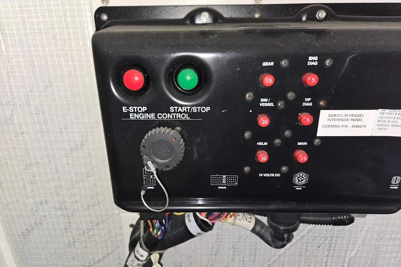 Slide: The Image of Engine control panel of 2010 American Tug "34" Pilothouse Trawler with emergency stop and start buttons. - 112