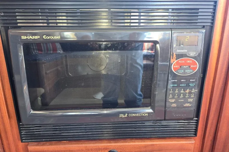 Slide: The Image of Sharp Carousel microwave in 2010 American Tug "34" Pilothouse Trawler kitchen. - 41