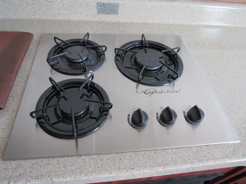 Slide: The Image of Four-burner gas stove on 2010 American Tug 34 Pilothouse Trawler. - 5