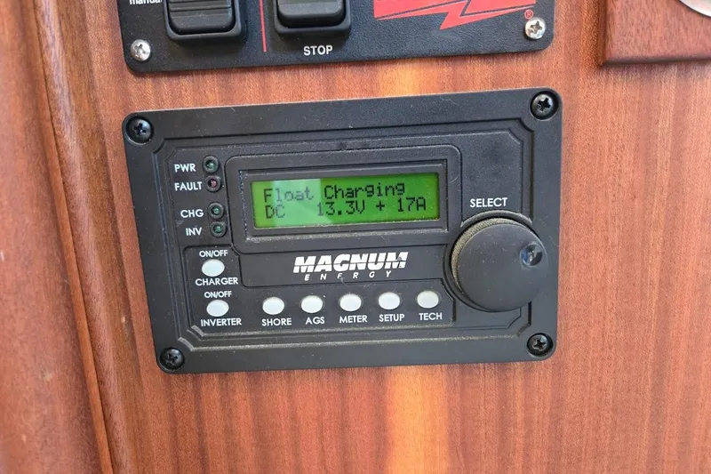 Slide: The Image of Magnum Energy charger display on 2010 American Tug "34" Pilothouse Trawler, showing float charging status. - 62