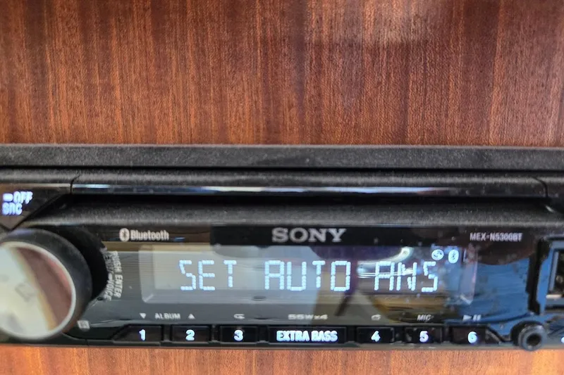 Slide: The Image of Sony stereo system in 2010 American Tug "34" Pilothouse Trawler displaying "Set Auto AWS". - 64