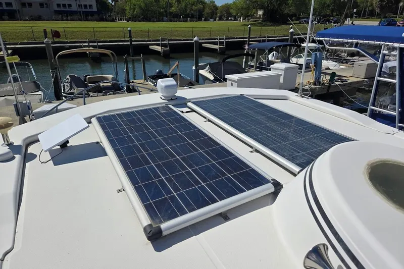 Slide: The Image of Solar panels on 2010 American Tug "34" Pilothouse Trawler, docked at marina. - 83