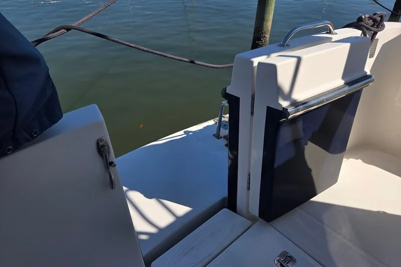 Slide: The Image of American Tug "34" Pilothouse Trawler 2010, deck view with water background. - 97