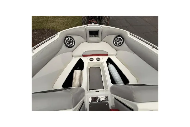Slide: The Image of Interior of 2013 Centurion Enzo SV244 boat with gray seating and speakers. - 14