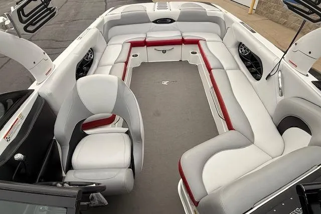 Slide: The Image of Interior of a 2013 Centurion Enzo SV244 boat with spacious seating and modern design. - 16