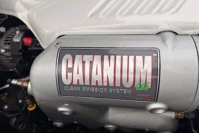 Slide: The Image of Close-up of a 2013 Centurion Enzo SV244 engine with Cataniun Clean Emission System label. - 24