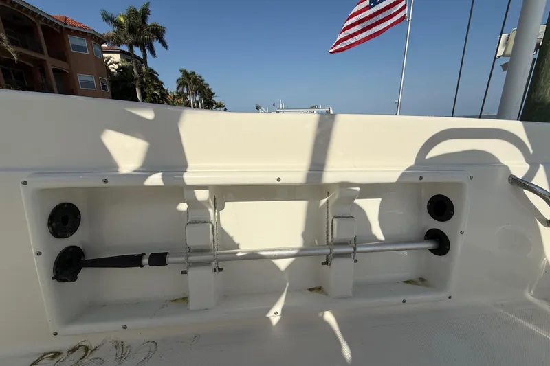 Slide: The Image of 2018 NauticStar 211 Coastal boat interior with American flag in background. - 16
