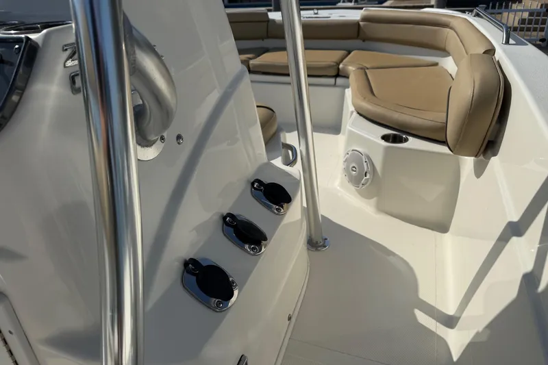 Slide: The Image of 2018 NauticStar 211 Coastal boat interior with seating and control panel. - 9