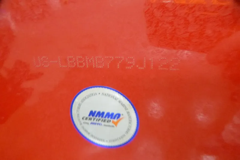 Slide: The Image of 2022 Lund 1650 Angler Sport with NMMA certification sticker and hull identification number. - 13