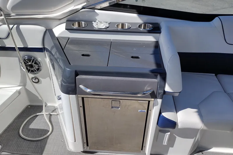 Slide: The Image of 2022 Formula 310 Bowrider interior with sleek seating and built-in amenities. - 19