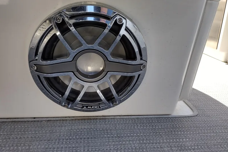 Slide: The Image of JL Audio speaker on 2022 Formula 310 Bowrider boat interior. - 36