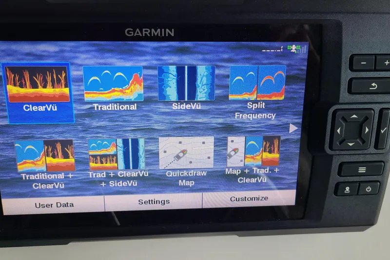 Slide: The Image of Garmin fishfinder display on 2019 Boston Whaler 150 Montauk, showing sonar options. - 13