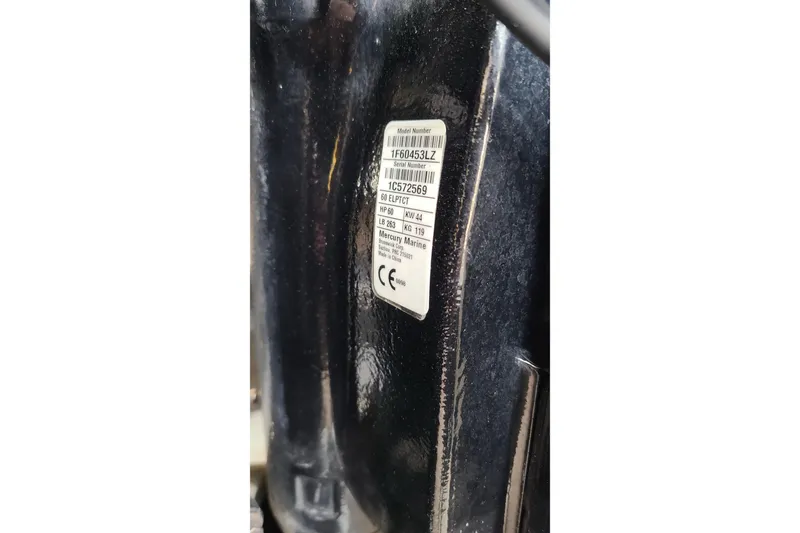 Slide: The Image of Label on a 2019 Boston Whaler 150 Montauk boat engine. - 19