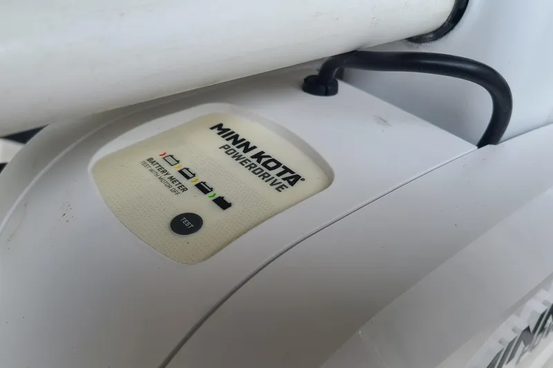 Slide: The Image of Minn Kota PowerDrive battery meter on 2019 Boston Whaler 150 Montauk boat. - 7