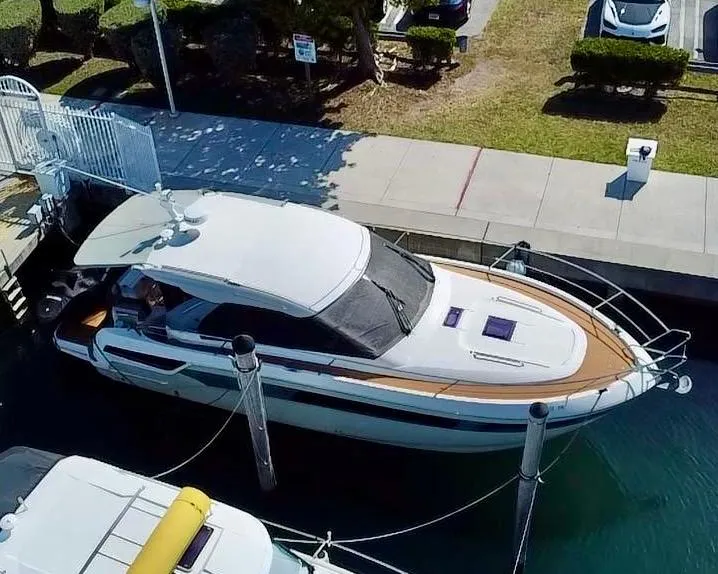 Slide: The Image of 2018 Bavaria S40 Coupe docked at marina, aerial view. - 11