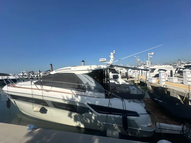Slide: The Image of 2018 Bavaria S40 Coupe yacht docked at marina under clear blue sky. - 4