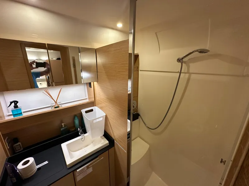 Slide: The Image of Bathroom interior of 2018 Bavaria S40 Coupe yacht, featuring modern sink and shower. - 42