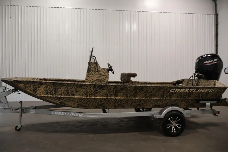 Slide: The Image of 2024 Crestliner 1870 Retriever FCC boat with camouflage design on trailer. - 8