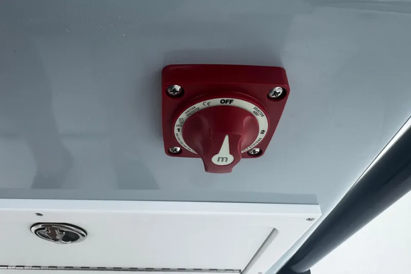 Slide: The Image of Red switch on Piranha Casador B2200, 2026 model, mounted on a gray panel. - 26