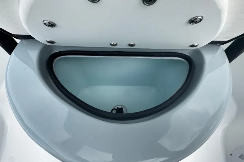 Slide: The Image of Open storage compartment of 2026 Piranha Casador B2200 boat. - 28