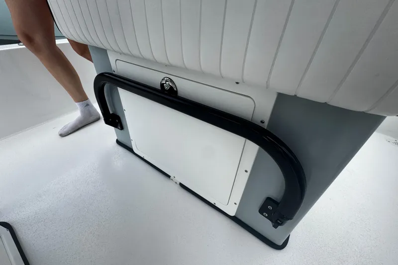 Slide: The Image of 2026 Piranha Casador B2200 boat interior with white seating and black handle. - 29