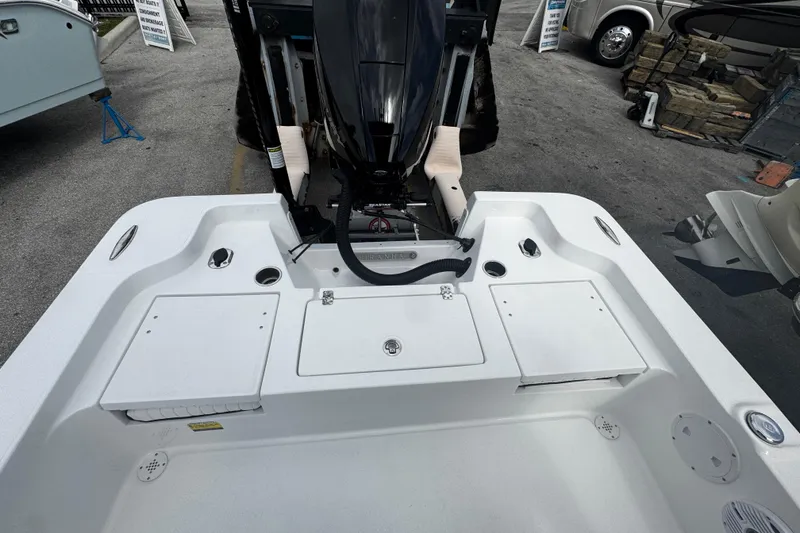 Slide: The Image of 2026 Piranha Casador B2200 boat stern with motor and storage compartments. - 7