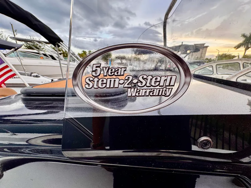 Slide: The Image of 2025 Sea Pro 202 Center Console with 5-year stem-to-stern warranty badge. - 26