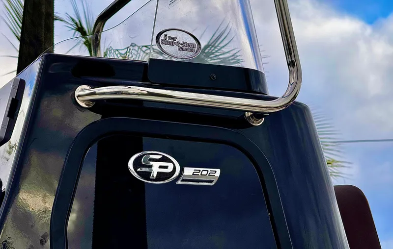 Slide: The Image of 2025 Sea Pro 202 Center Console boat with sleek design and logo detail. - 30