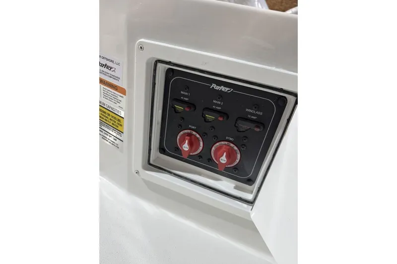 Slide: The Image of Control panel of 2025 Parker 2420 Sport Cabin boat with switches and labels. - 20