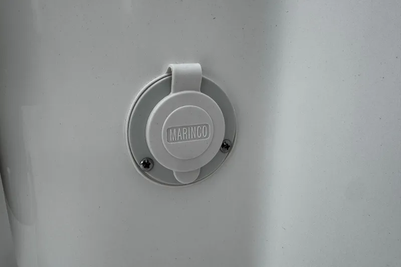 Slide: The Image of Marinco outlet on 2026 Sea Pro 240 Dual Console boat, close-up view. - 24