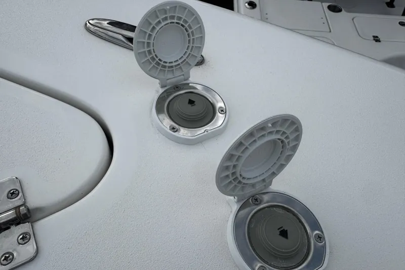 Slide: The Image of 2026 Sea Pro 240 Dual Console boat fuel and water fill ports. - 28