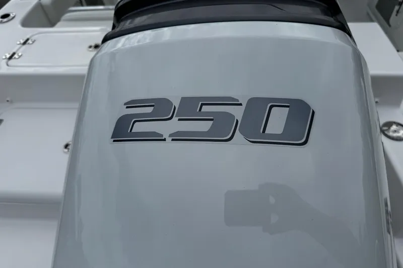 Slide: The Image of Close-up of 250 horsepower engine on 2026 Sea Pro 240 Dual Console boat. - 35