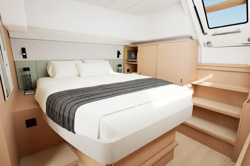 Slide: The Image of Luxurious bedroom in Lagoon 47 catamaran, model year 2026. - 15