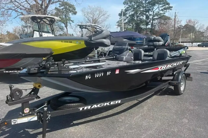 The Image of 2025 Tracker Pro 170 boat on trailer in parking lot. - 0