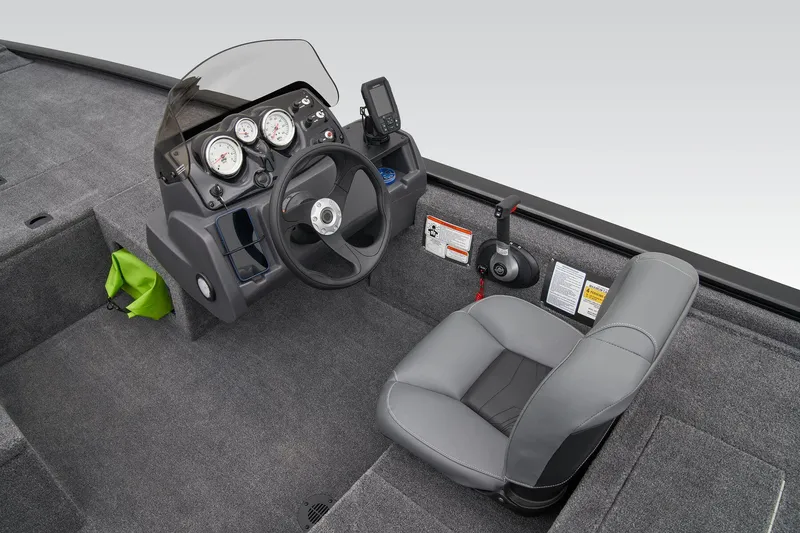 Slide: The Image of Manufacturer Provided Image: 2025 Tracker Pro 170 boat interior with steering console and gray seating. - 36