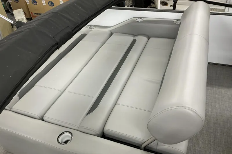 Slide: The Image of 2025 Bentley Pontoons Legacy 240 Swingback with luxurious seating and sleek design. - 11