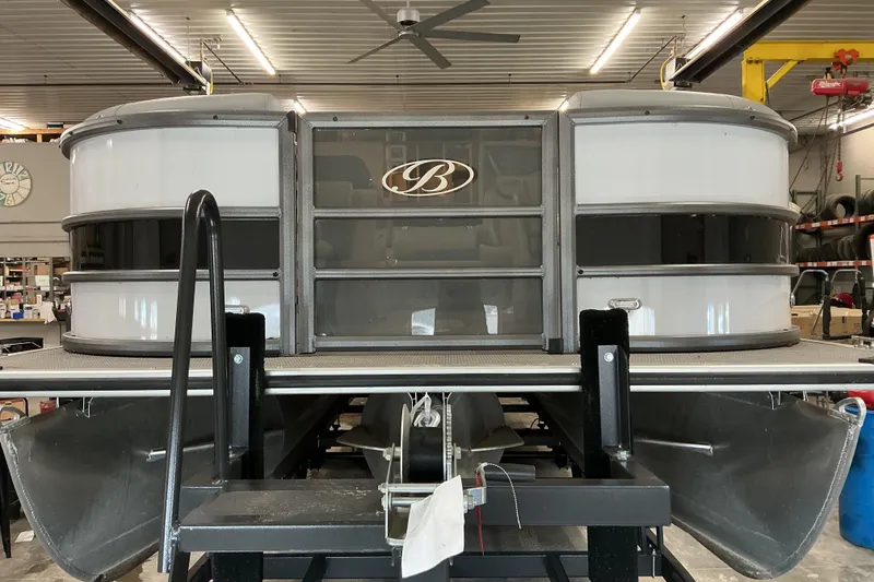 Slide: The Image of 2025 Bentley Pontoons Legacy 240 Swingback in a workshop setting. - 3