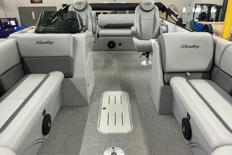 Slide: The Image of 2025 Bentley Pontoons Legacy 240 Swingback interior with luxurious seating and modern design. - 8