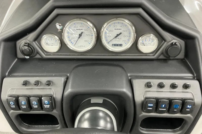 Slide: The Image of Dashboard of 2025 Bentley Pontoons Legacy 240 Swingback with gauges and controls. - 9