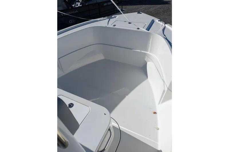 Slide: The Image of 2025 Parker 18SE Center Console boat interior, showcasing spacious seating area. - 3