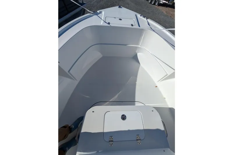 Slide: The Image of 2025 Parker 18SE Center Console boat interior, showcasing spacious seating and storage. - 5