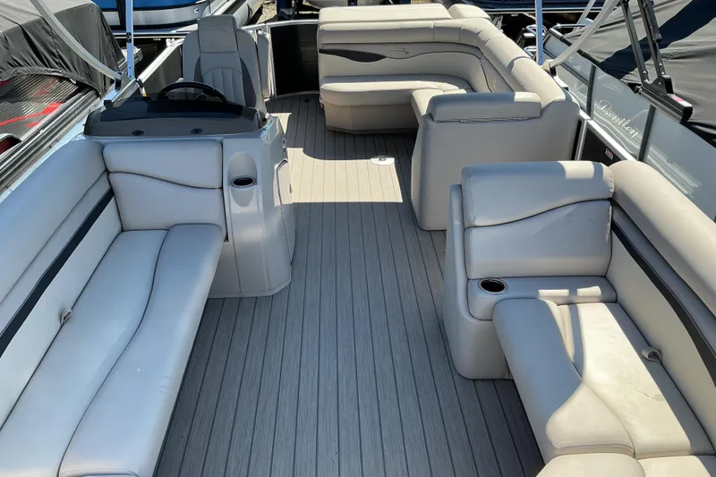 Slide: The Image of 2018 Bennington SX 21 SLXP pontoon boat interior with spacious seating and modern design. - 13