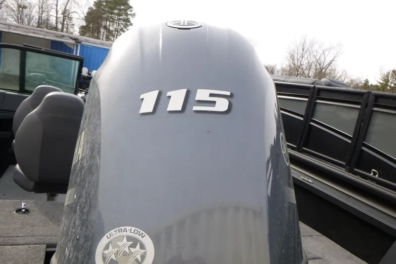 Slide: The Image of 2025 Alumacraft Competitor 175X Sport boat with 115 horsepower engine, outdoor setting. - 15