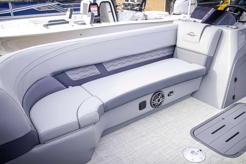 Slide: The Image of Luxurious seating on 2025 SunCatcher Fusion 322RC boat, featuring sleek design and modern amenities. - 11