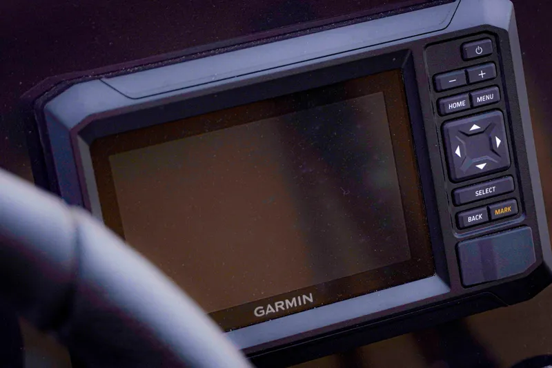 Slide: The Image of Garmin display on 2025 SunCatcher Fusion 322RC boat dashboard. - 14