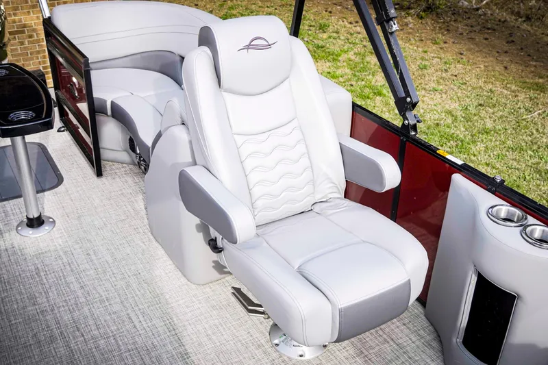 Slide: The Image of Luxurious seating on 2025 SunCatcher Fusion 322RC pontoon boat, featuring plush white upholstery. - 18