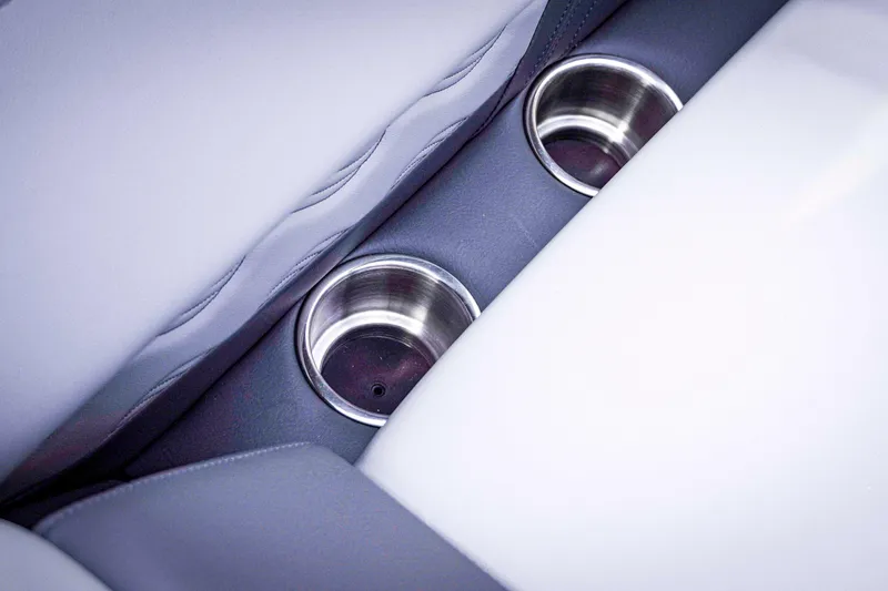 Slide: The Image of Cup holders in SunCatcher Fusion 322RC 2025 boat, featuring sleek, modern design. - 25
