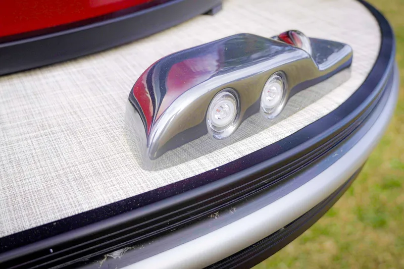 Slide: The Image of Close-up of SunCatcher Fusion 322RC 2025 boat detail with sleek design and LED lights. - 5