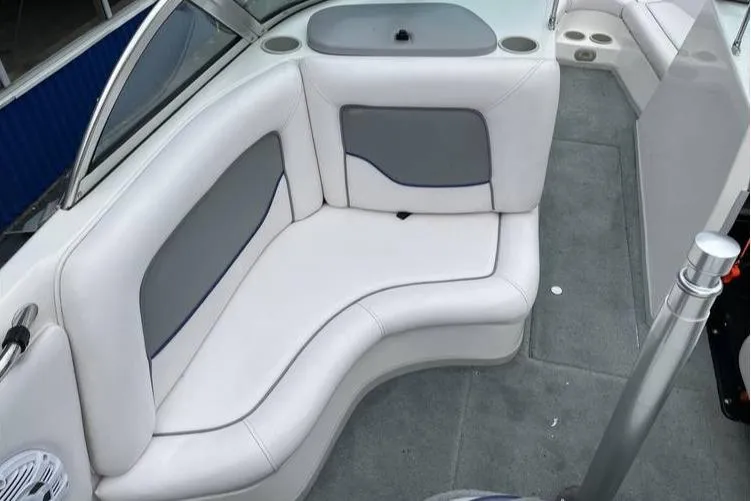 Slide: The Image of 2001 Supra Legacy boat interior with white and gray seating. - 3