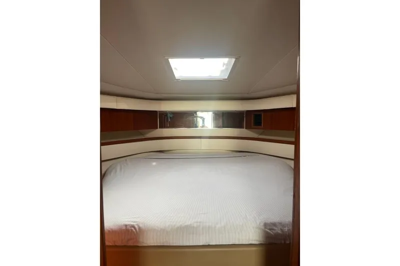 Slide: The Image of Interior cabin of 2002 Tiara Yachts 4300 Open with bed and skylight. - 11